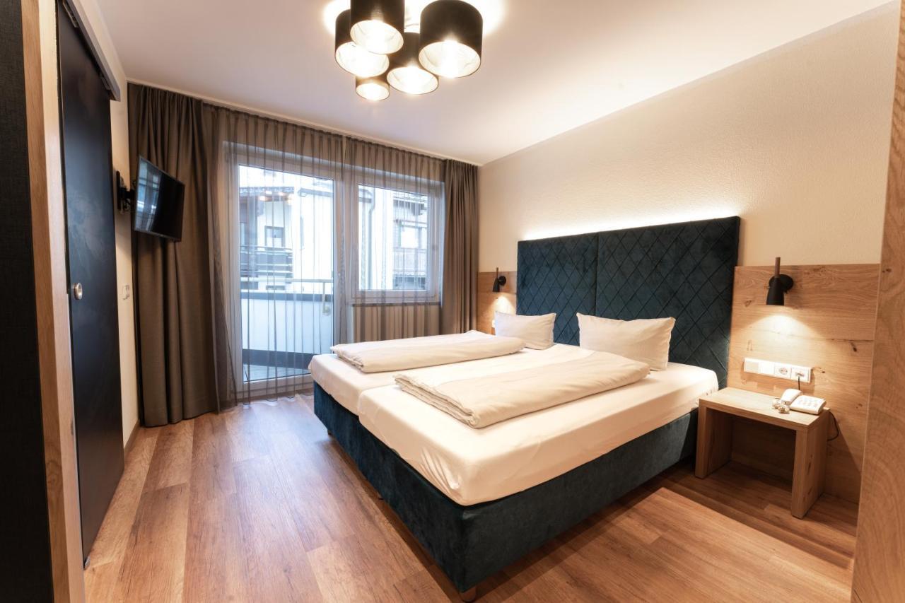 Aparthotel Dorfplatzl Garni トゥクス エクステリア 写真